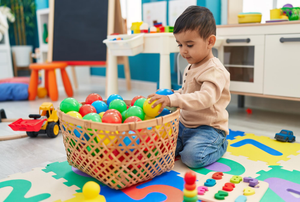 Child enjoying playful learning and developing motor skills at Welmont Preschool in Jaipur