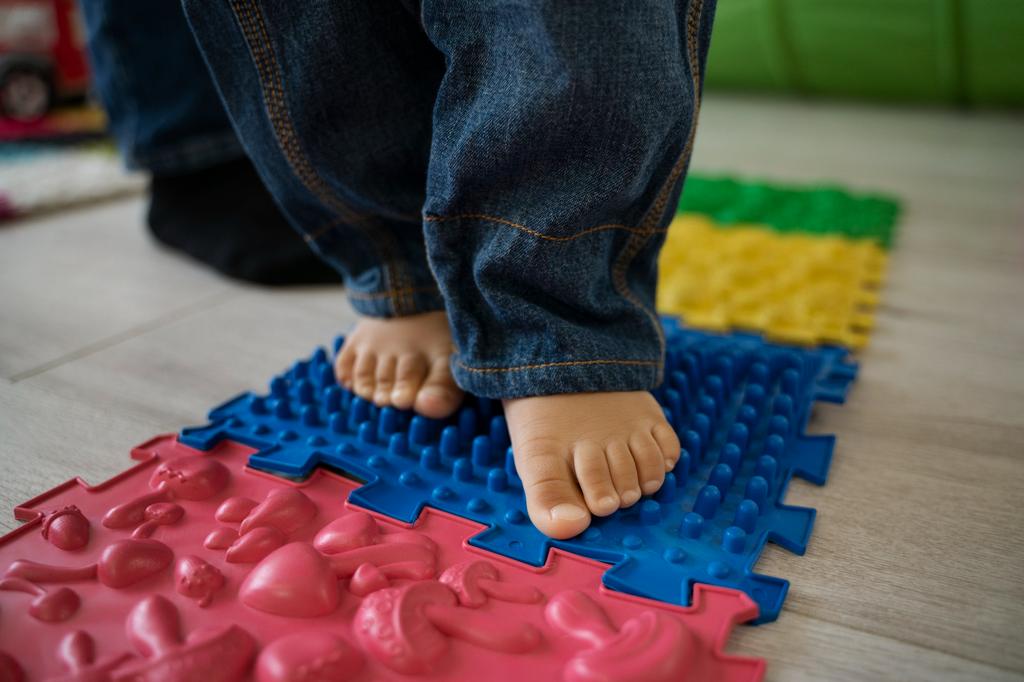 Child exploring sensory play and developing motor skills at Welmont Preschool in Jaipur